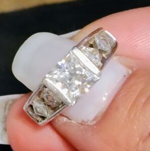 Genuine MOISSANITE set in pure silver size 6